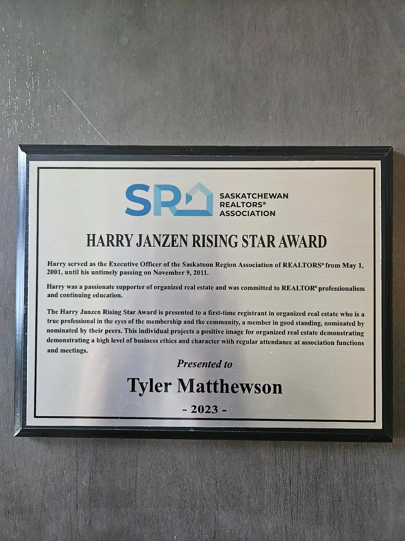 Harry Janzen Rising Star Award certificate presented to Tyler Matthewson